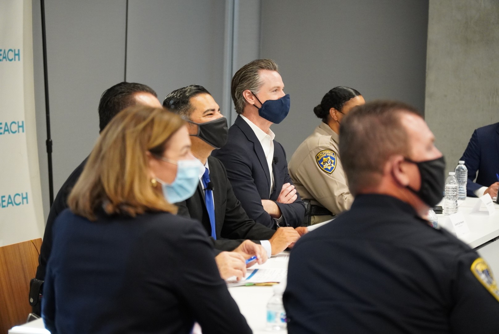 Governor sits at table with law enforcement leaders