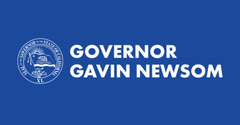 White “Governor Gavin Newsom” logo beside a walking California grizzly bear and star on a blue background.