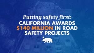 A graphic with a blue background that says Putting safety first: California awards $140 million in road safety projects
