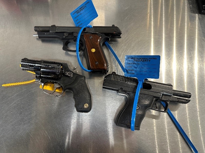 A photo of three guns