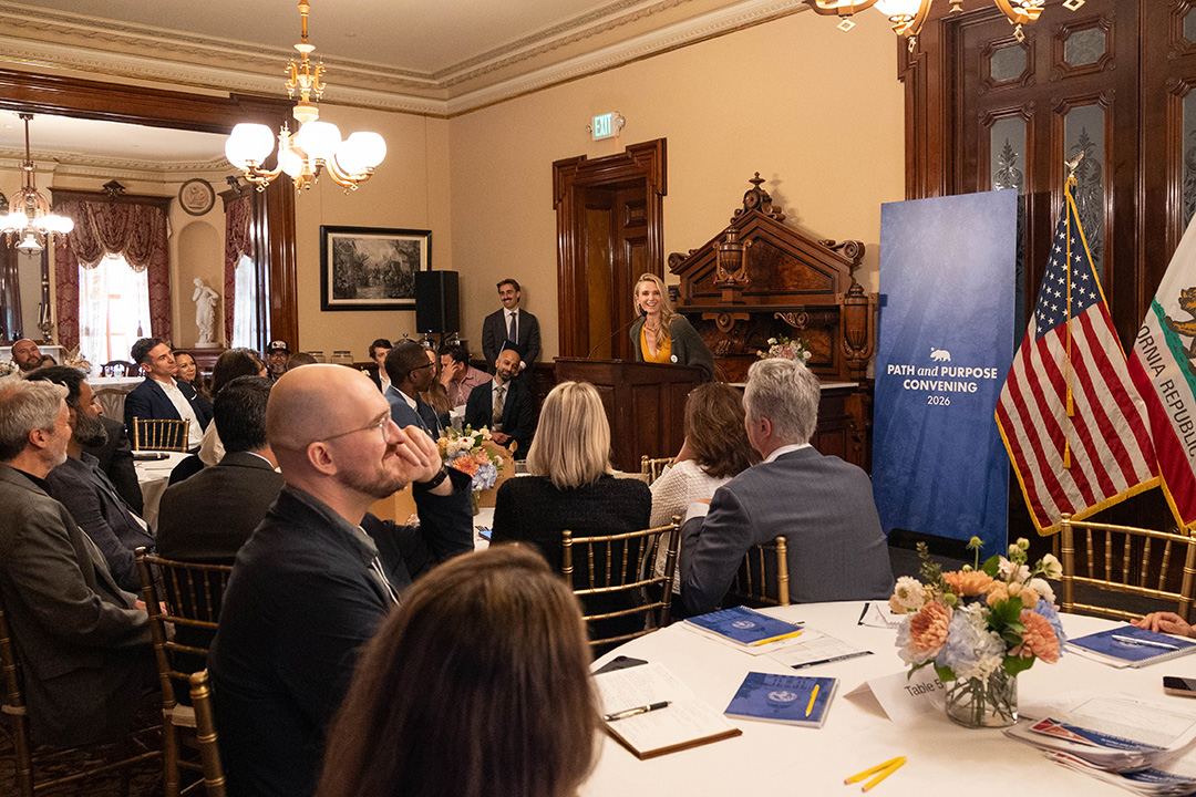 Photo of Jennifer Siebel Newsom speaking to a room filled with people
