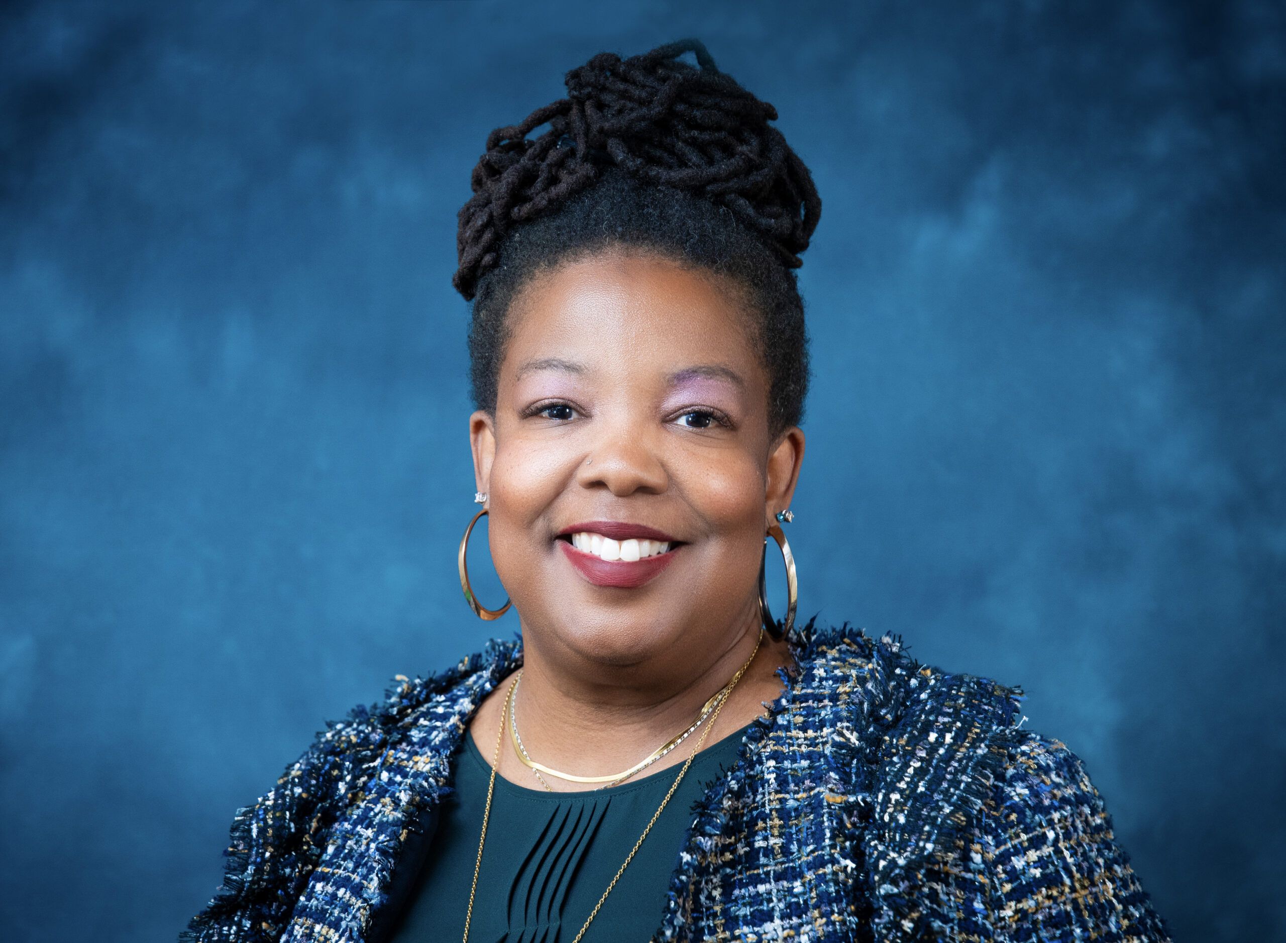 Headshot of Secretary Tomiquia Moss